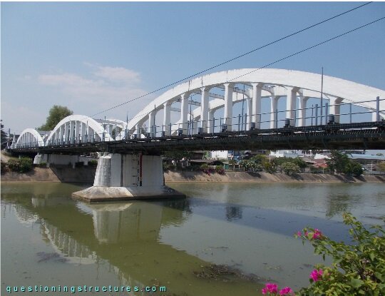 Tied-arch bridge over a river (link-image to arch bridge 2).