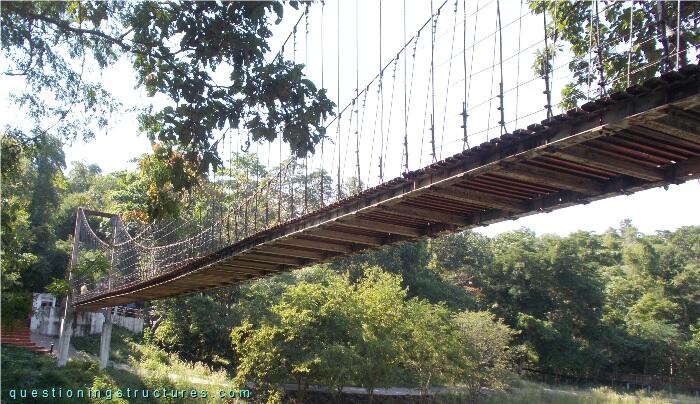  Pedestrian suspension bridge in a park