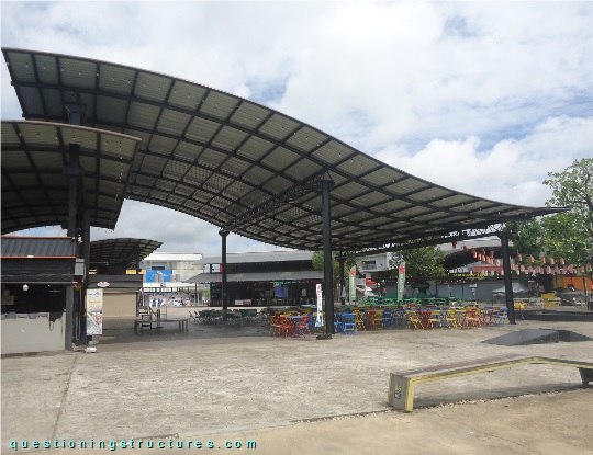 Restaurant patio with a double-curved roof (link-image to commercial building 5)