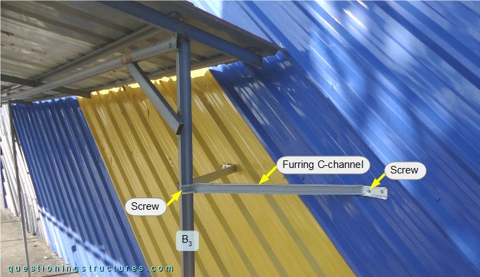 Structural connection between carport and building