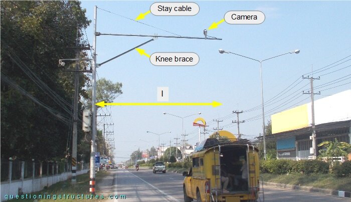 Traffic camera pole with a knee brace and a stay cables